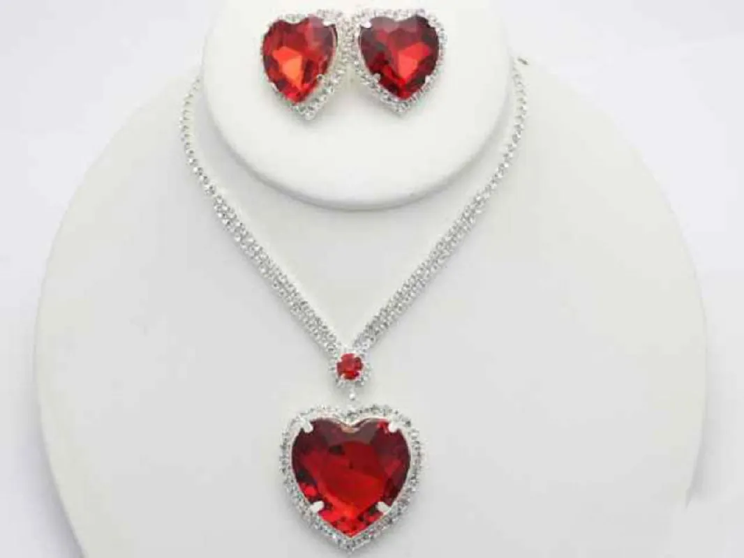 Silver Red Stone Heart Shape Trimmed Pendant Necklace with Matching Stud Earrings ( 18369 ) made by Oh My Jewelry