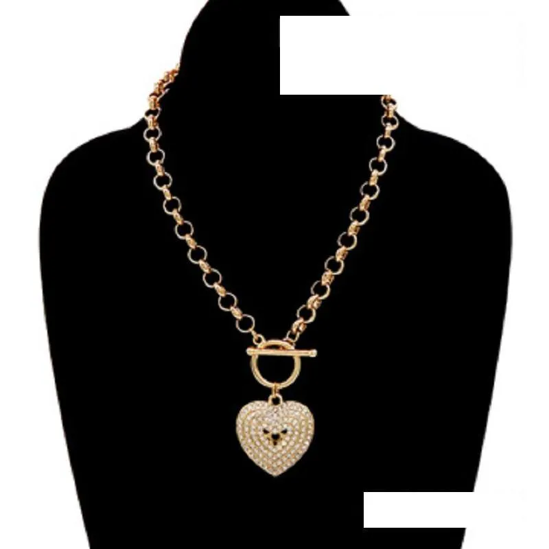 GOLD NECKLACE HEART PENDANT CLEAR STONES ( 3478 GDCLR ) sold by Oh My Jewelry