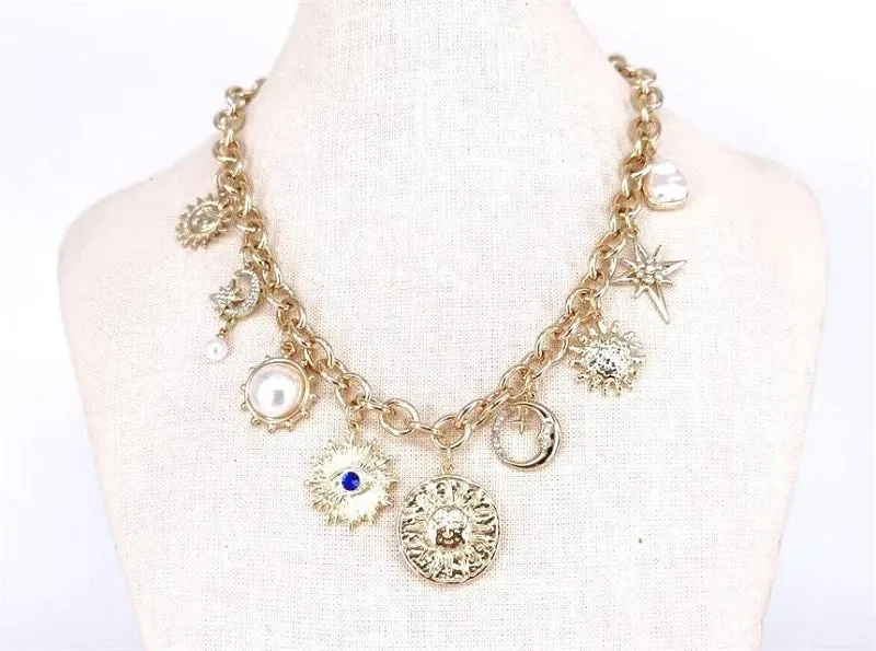 GOLD NECKLACE DANGLING CHARMS ( 2439 GDCRCL ) sold by Oh My Jewelry