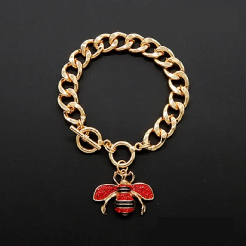 GOLD RED RHINESTONE TOGGLE CHARM BRACELET ( 2210 GDRED ) sold by Oh My Jewelry