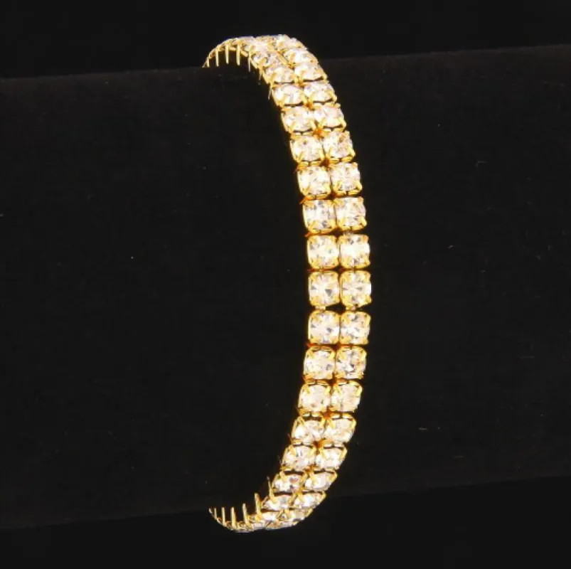 2 LINE GOLD STRETCH BRACELET WITH CLEAR RHINESTONES ( 1054 GCRY) sold by Oh My Jewelry