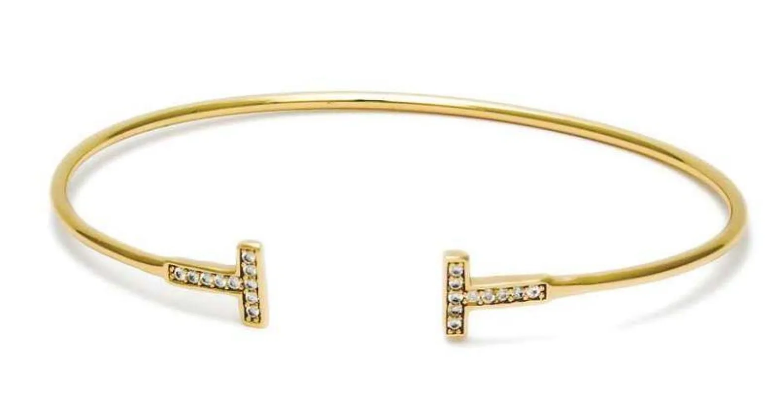 GOLD CUFF BANGLE T CZ CUBIC ZIRCONIA STONES ( 5569 G ) made by Oh My Jewelry