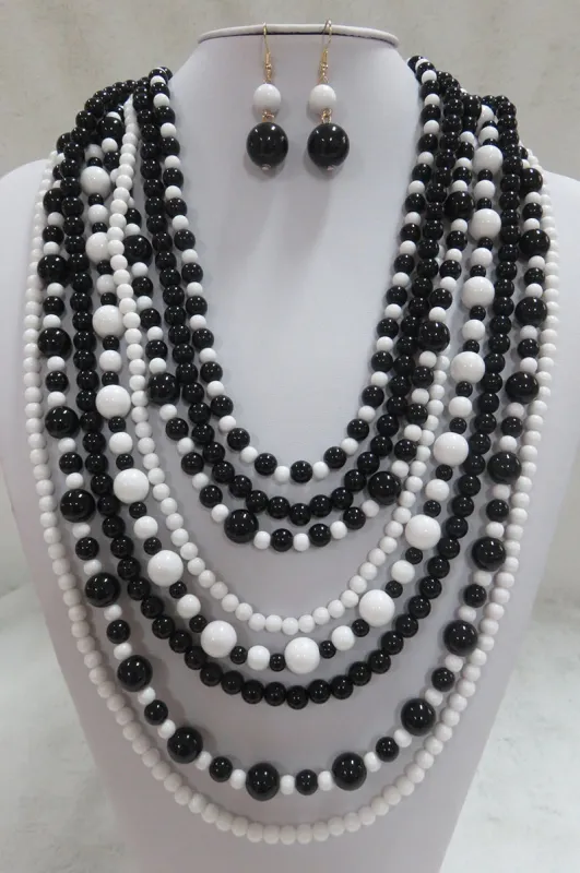 BLACK WHITE MULTI LAYERED NECKLACE WITH EARRINGS ( 556 BKWT ) sold by Oh My Jewelry