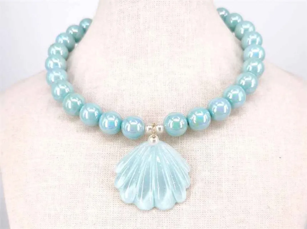 AQUA BLUE NECKLACE WITH CLAM ( 1923 GDAQ ) sold by Oh My Jewelry