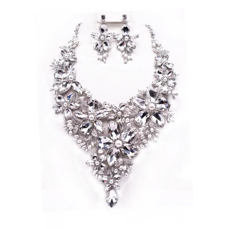 SILVER METAL FLOWER NECKLACE CLEAR STONES ( 12693 R ) sold by Oh My Jewelry