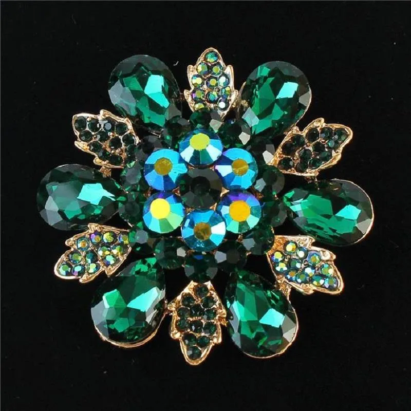 GOLD FLOWER BROOCH WITH GREEN STONES ( 1189 GGN ) sold by Oh My Jewelry