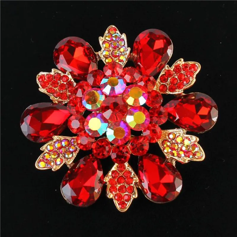 GOLD FLOWER BROOCH WITH RED STONES ( 1189 GRED ) sold by Oh My Jewelry