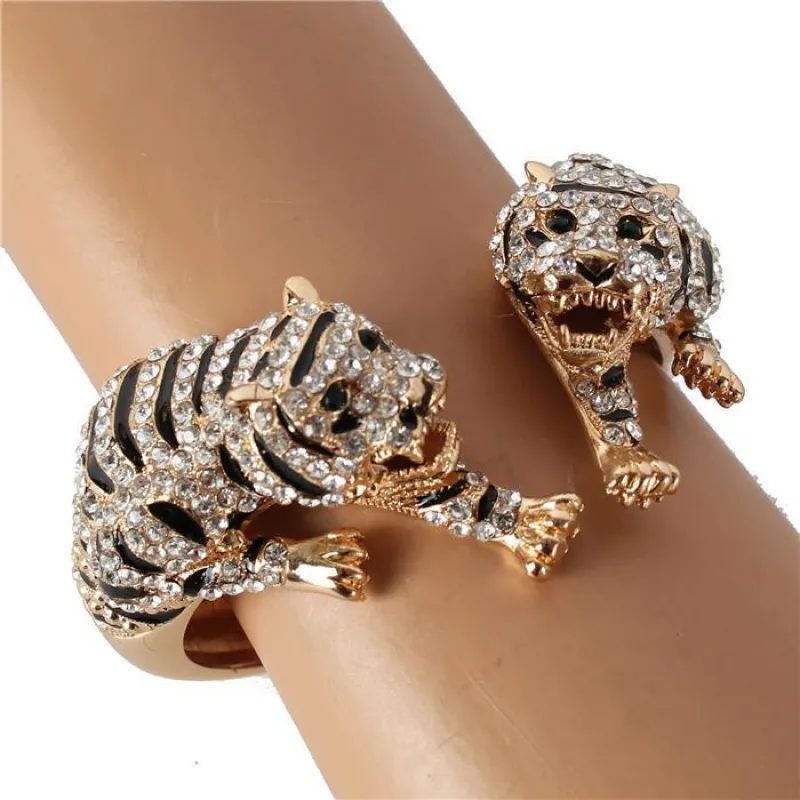 GOLD TIGER BANGLE CLEAR STONES ( C 604 2CL ) sold by Oh My Jewelry