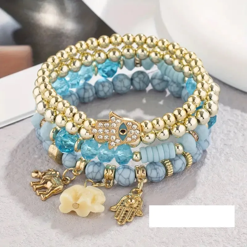 BLUE GOLD STRETCH HAMSA ELEPHANT BOHO STYLE BRACELETS ( 5524-9 BLU ) sold by Oh My Jewelry