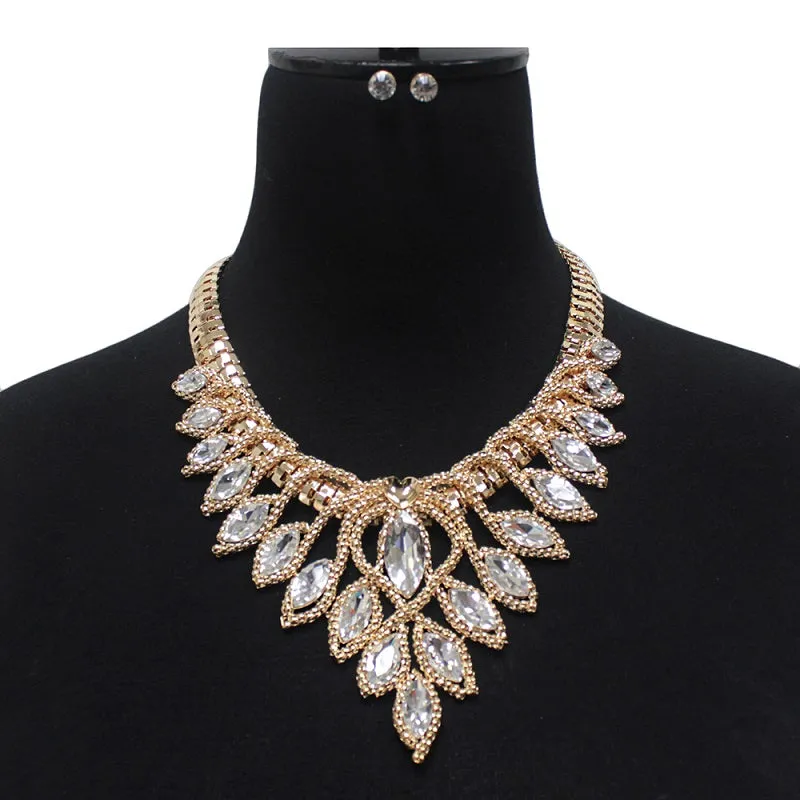 GOLD NECKLACE WITH CLEAR RHINESTONES AND MATCHING STUD EARRINGS ( 7166 GDCLR ) sold by Oh My Jewelry