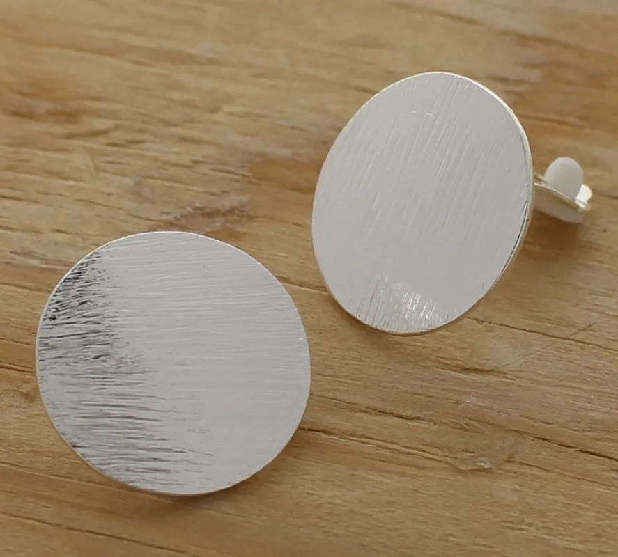Round Silver Textured Clip On Earrings 1" Diameter ( 34615 ) sold by Oh My Jewelry
