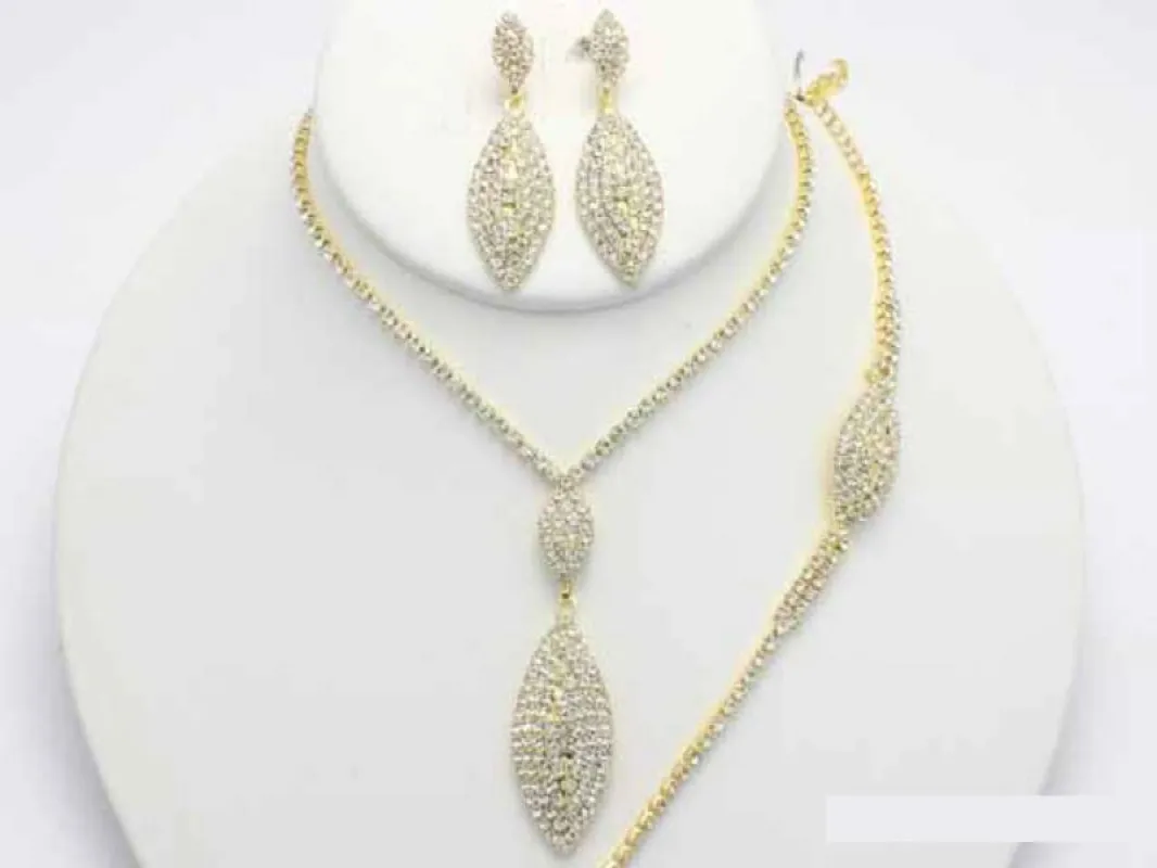 GOLD NECKLACE SET CLEAR STONES MATCHING BRACELET ( 18258 GCRY ) sold by Oh My Jewelry