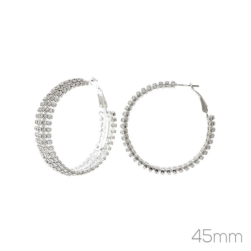 SILVER HOOP EARRINGS CLEAR STONES ( 27317 45 CRS ) sold by Oh My Jewelry