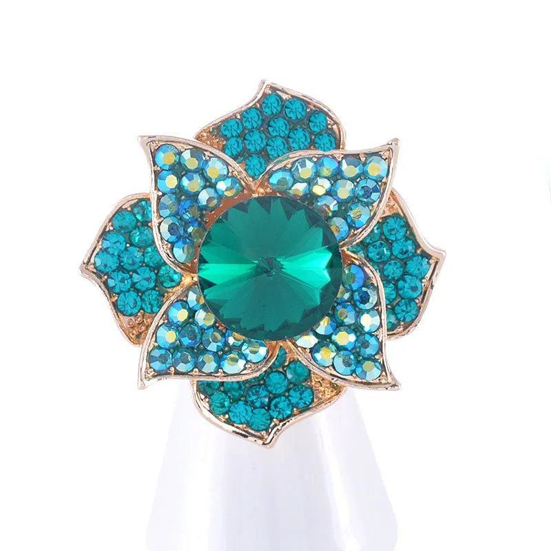 GOLD FLOWER RING BLUE STONES ( 1311 GBL ) sold by Oh My Jewelry