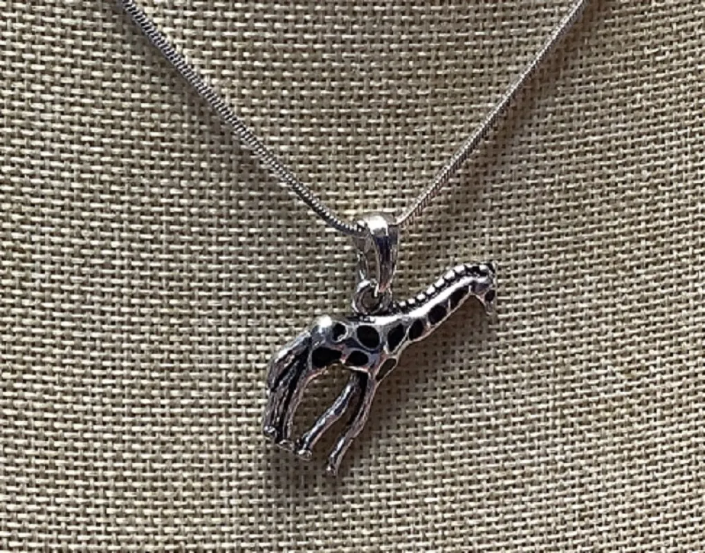 BLACK ENAMEL AND SILVER GIRAFFE CHARM NECKLACE ( 12130 ) sold by Oh My Jewelry