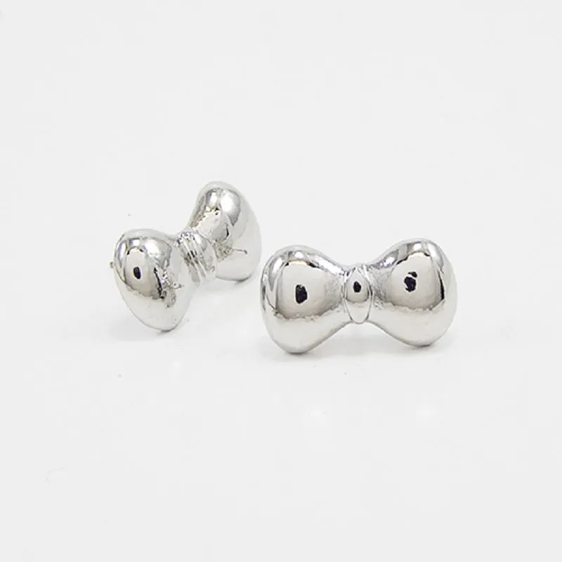 SILVER METAL BOW TIE EARRINGS ( 1325 RD ) sold by Oh My Jewelry