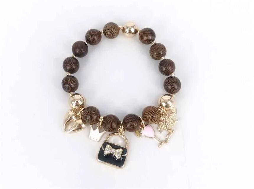 BROWN STRETCH BRACELET CHARMS ( 1867 GDBR ) sold by Oh My Jewelry
