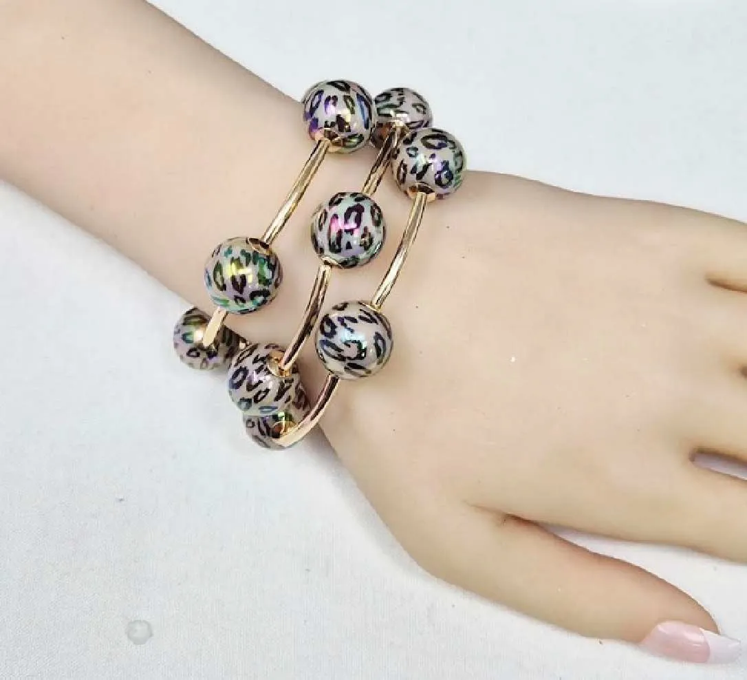 GOLD LEOPARD PRINT STRETCH BRACELET ( 20063 GLE ) sold by Oh My Jewelry