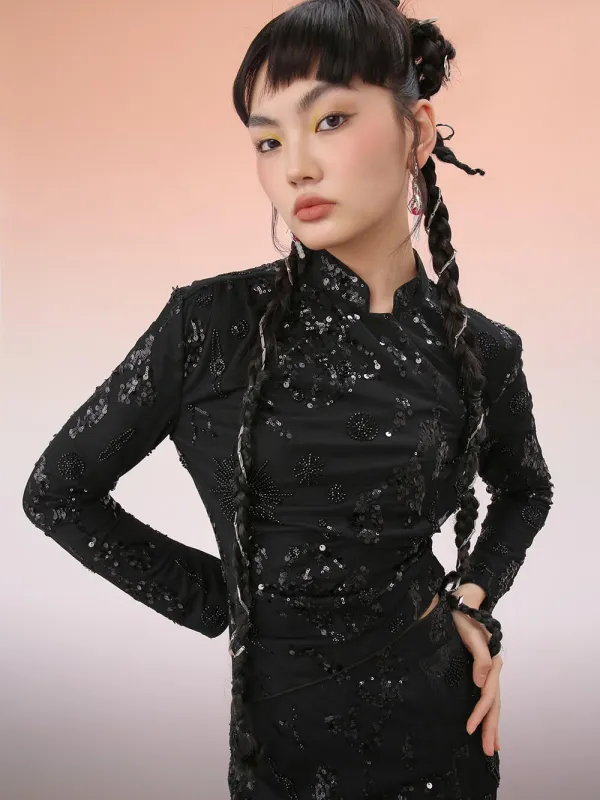 MUKZIN Mid-Length Asymmetric Black Top sold by Muzkin