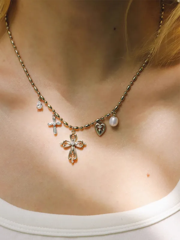 MUKTANK×SUN HUNTER Ornate lace cross necklace sold by Muzkin