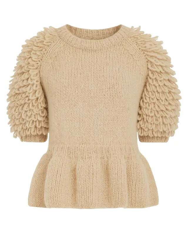 Selene Peplum Pullover sold by SHOWROOM