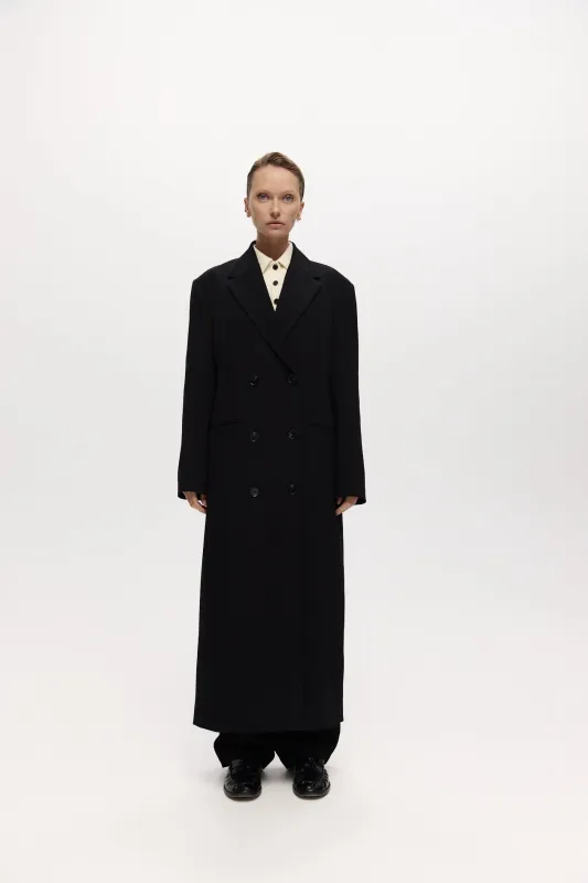 Long Egon Coat Black sold by Harris Tapper