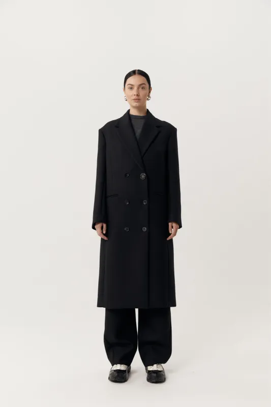 Egon Coat Black sold by Harris Tapper