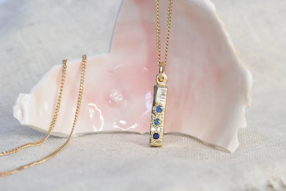 Pillar Pendant - Yellow Gold with Blue Sapphires sold by Sophie Divett Jewelry