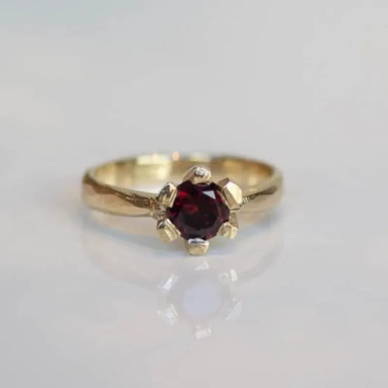 Sol Ring - Yellow Gold with Garnet sold by Sophie Divett Jewelry