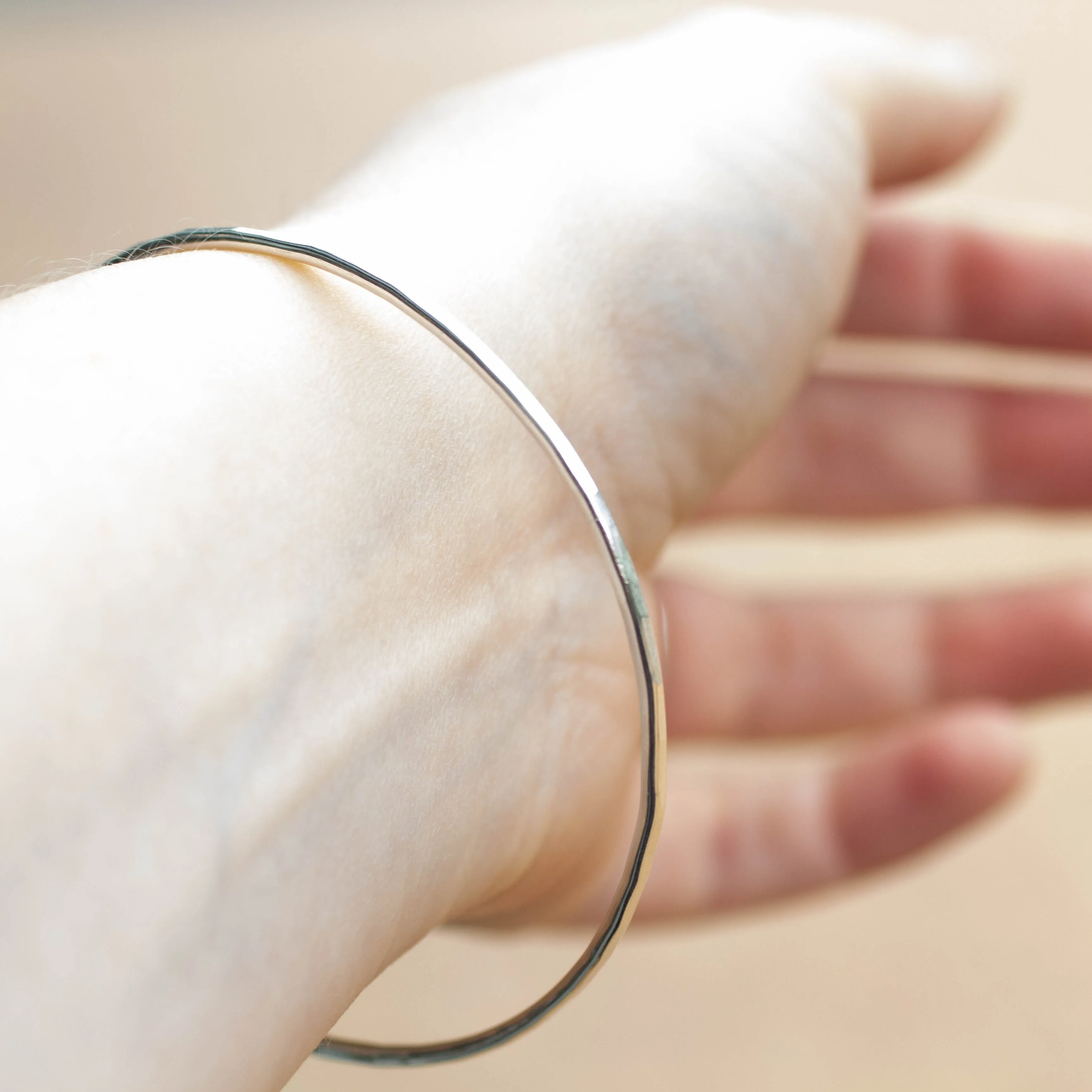 Hammered Bangle - 2mm- Sterling Silver sold by Sophie Divett Jewelry product image thumbnail 4