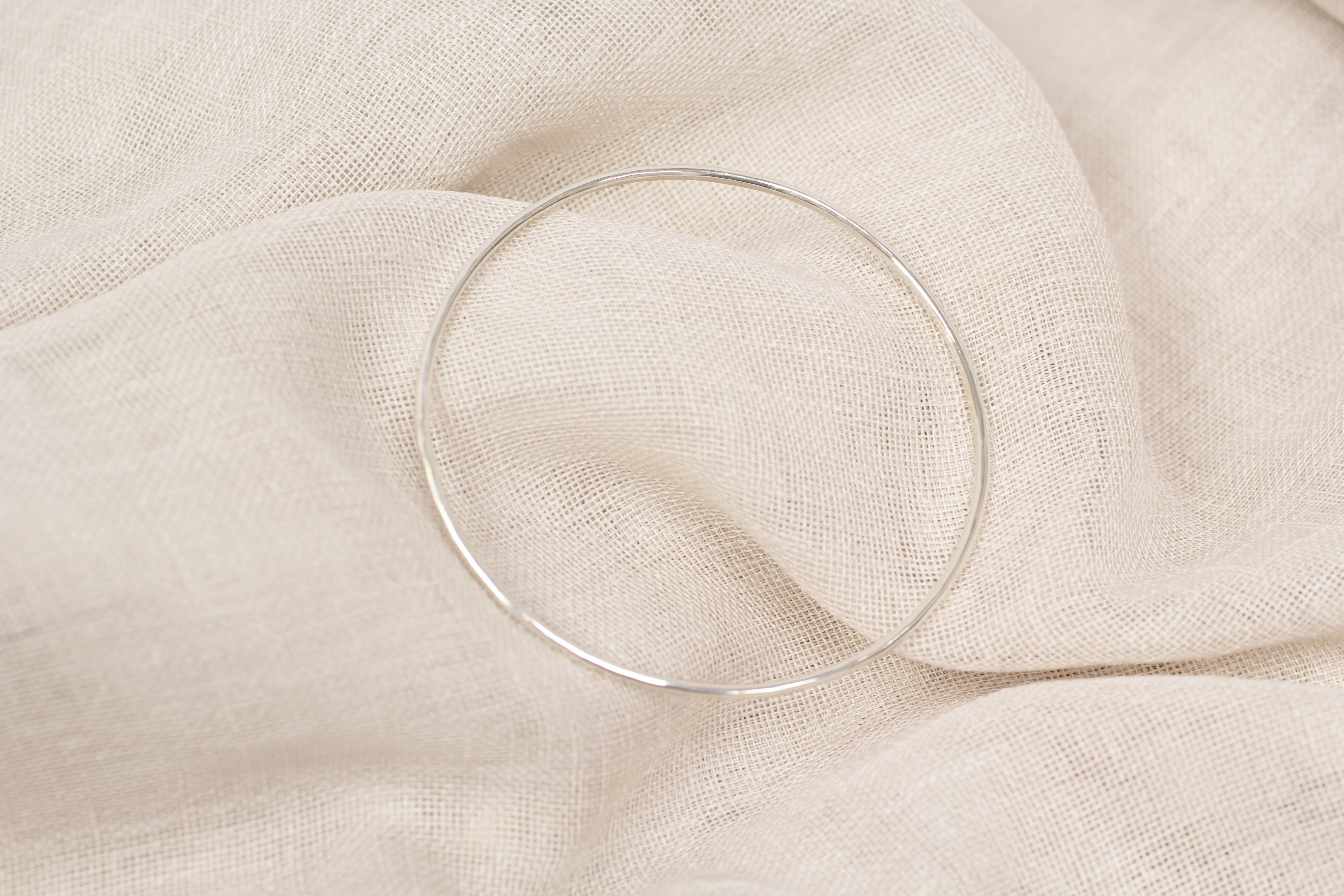 Hammered Bangle - 2mm- Sterling Silver sold by Sophie Divett Jewelry product image thumbnail 5