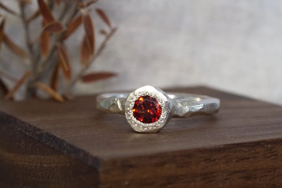 Neve Ring - Sterling Silver with Garnet sold by Sophie Divett Jewelry