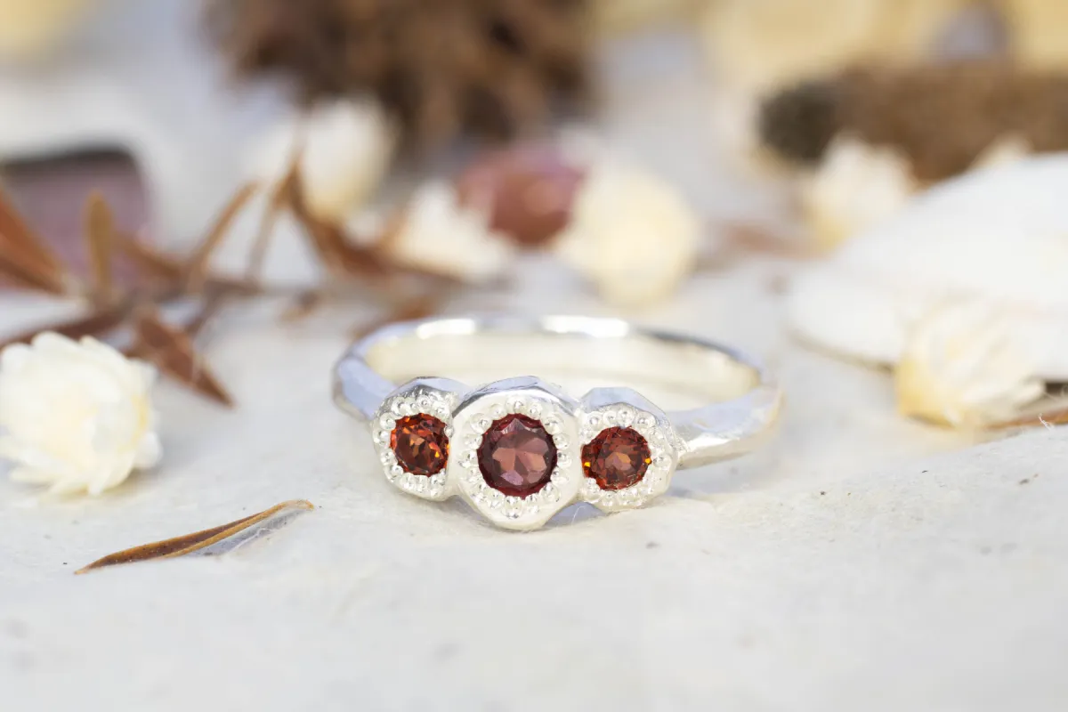 Torci Ring - Sterling Silver with Garnets sold by Sophie Divett Jewelry