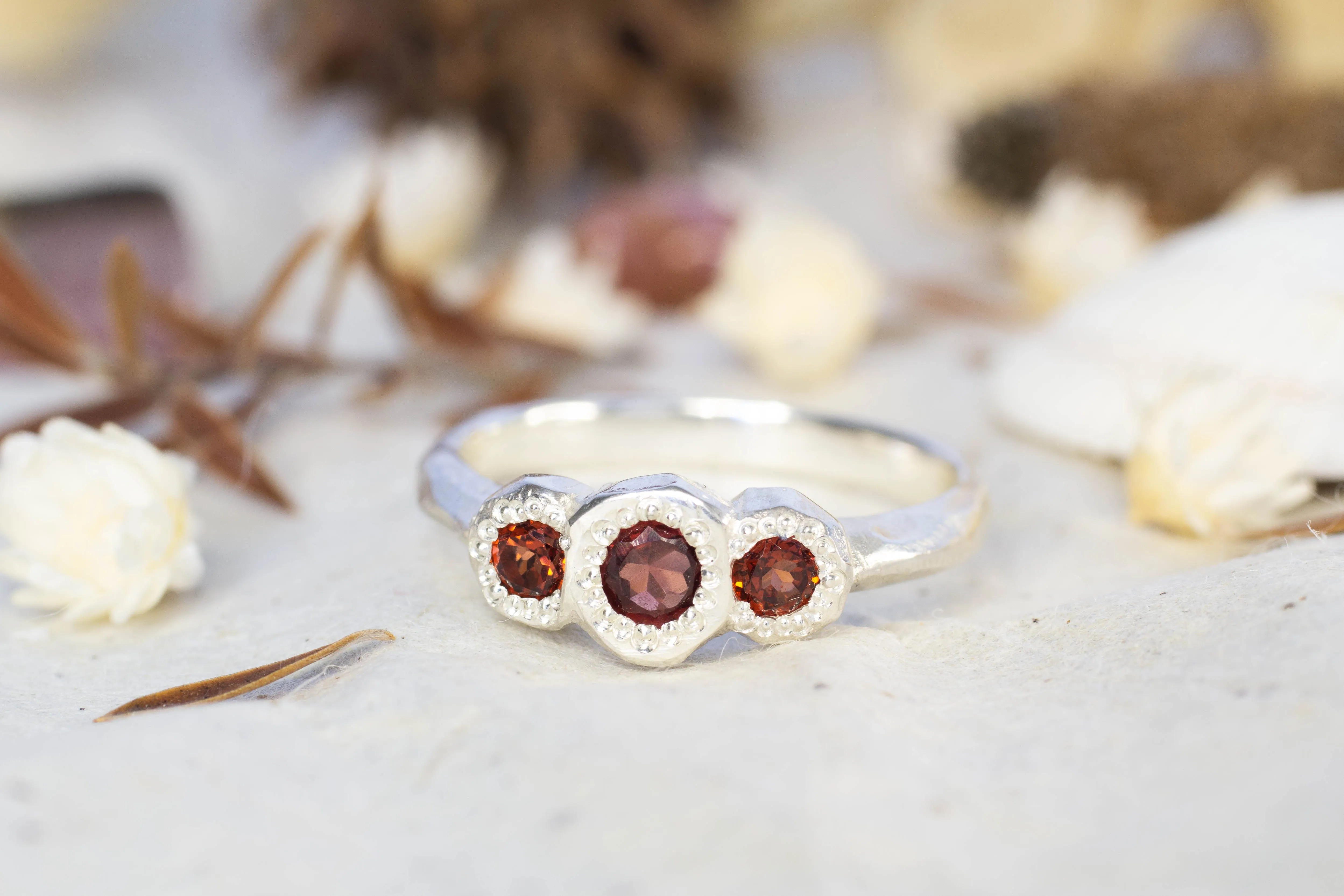 Torci Ring - Sterling Silver with Garnets sold by Sophie Divett Jewelry