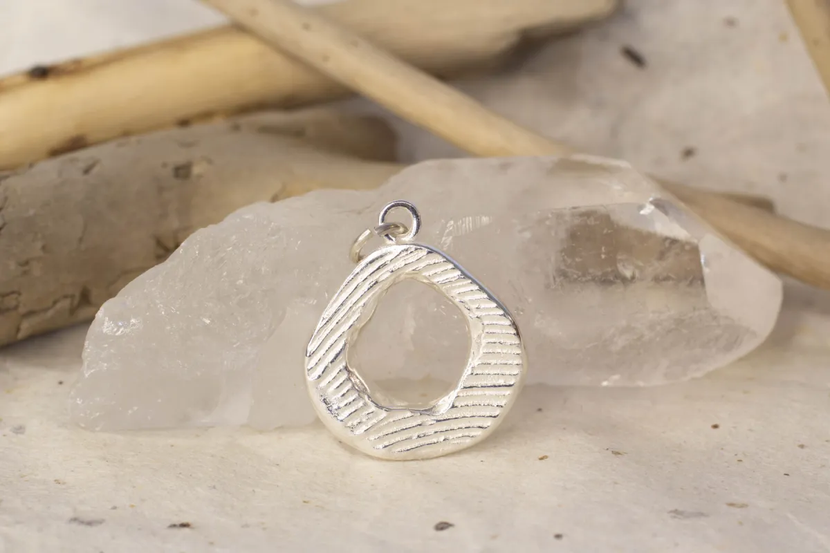 Tidepool Charm - Sterling Silver sold by Sophie Divett Jewelry