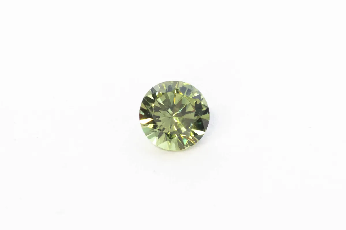 5.6mm Sapphire: 0.84ct Round - Green sold by Sophie Divett Jewelry