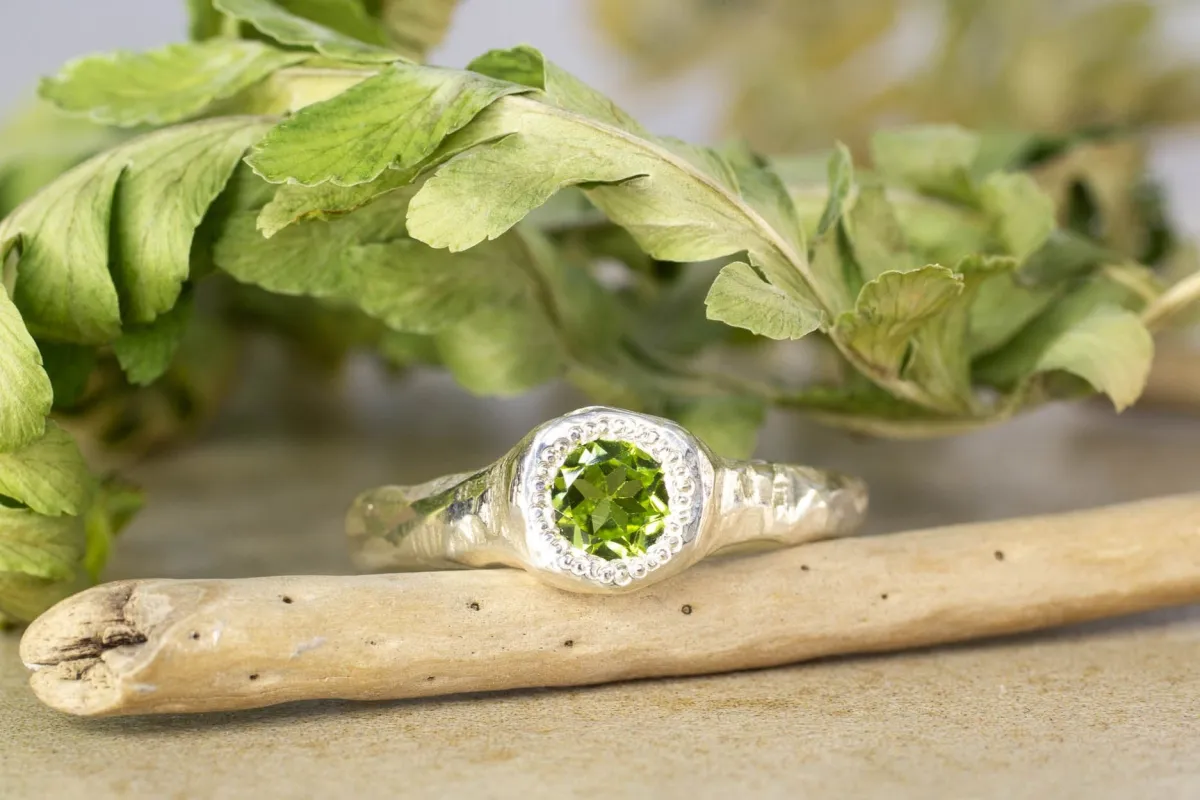 Spring Ring - Sterling Silver with Peridot sold by Sophie Divett Jewelry
