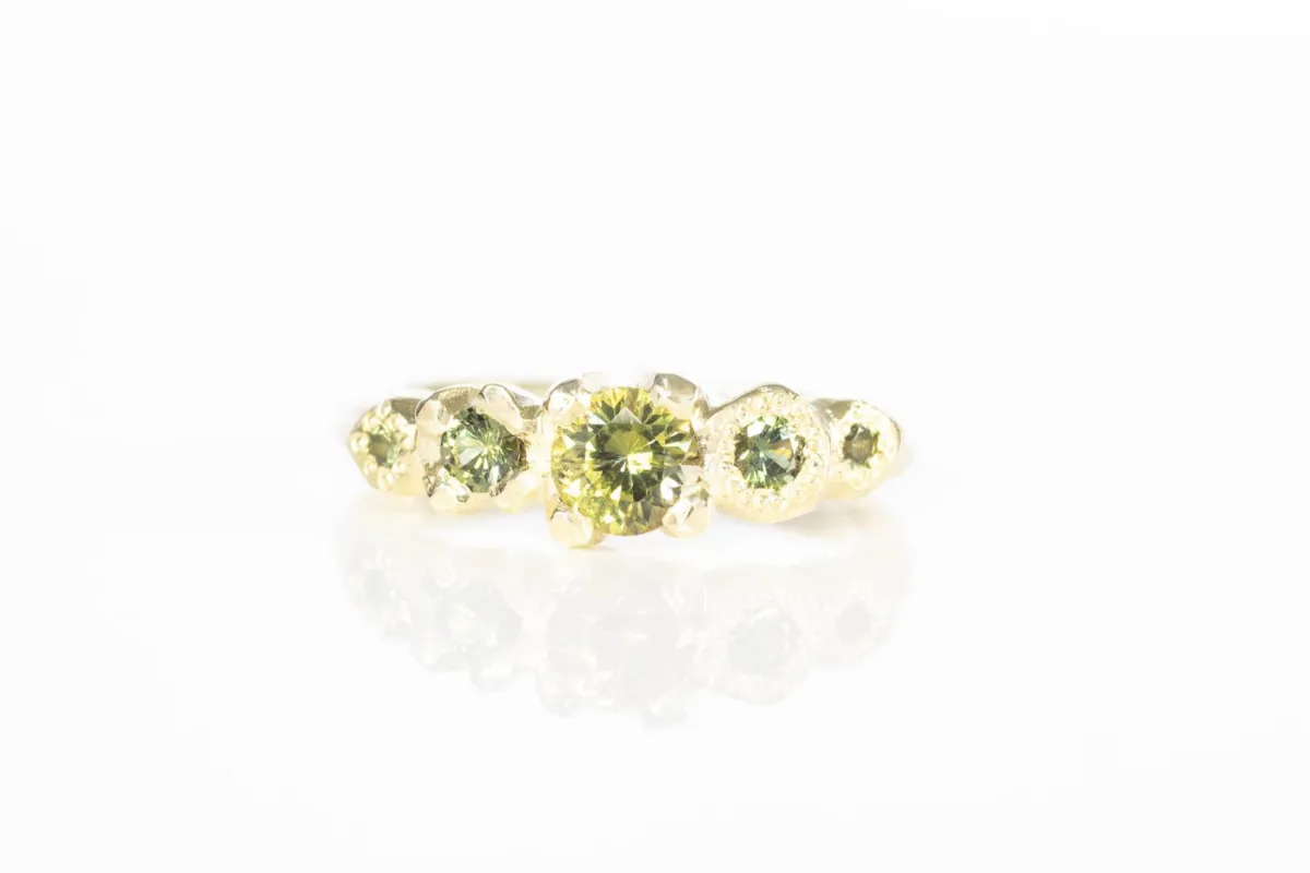 Orion Ring - 14ct Yellow Gold with Yellow-Green Sapphires sold by Sophie Divett Jewelry
