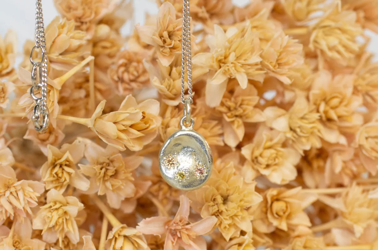 Water Drop Pendant - White Gold with Sunset Sapphires sold by Sophie Divett Jewelry