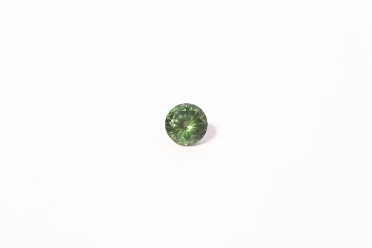 5.6mm Sapphire: 0.87ct Round - Green sold by Sophie Divett Jewelry