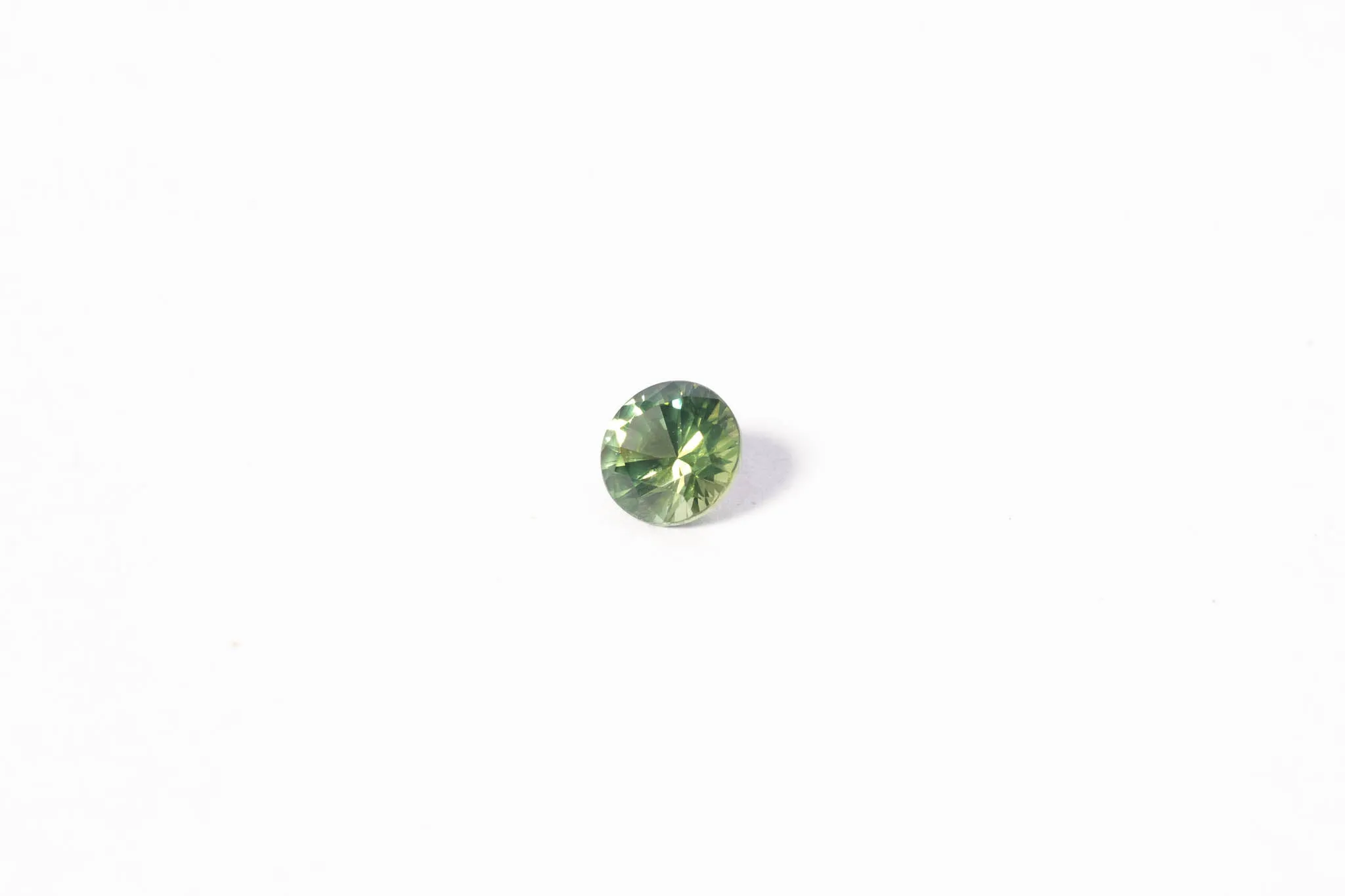 5.6mm Sapphire: 0.85ct Round - Green sold by Sophie Divett Jewelry product image thumbnail 2