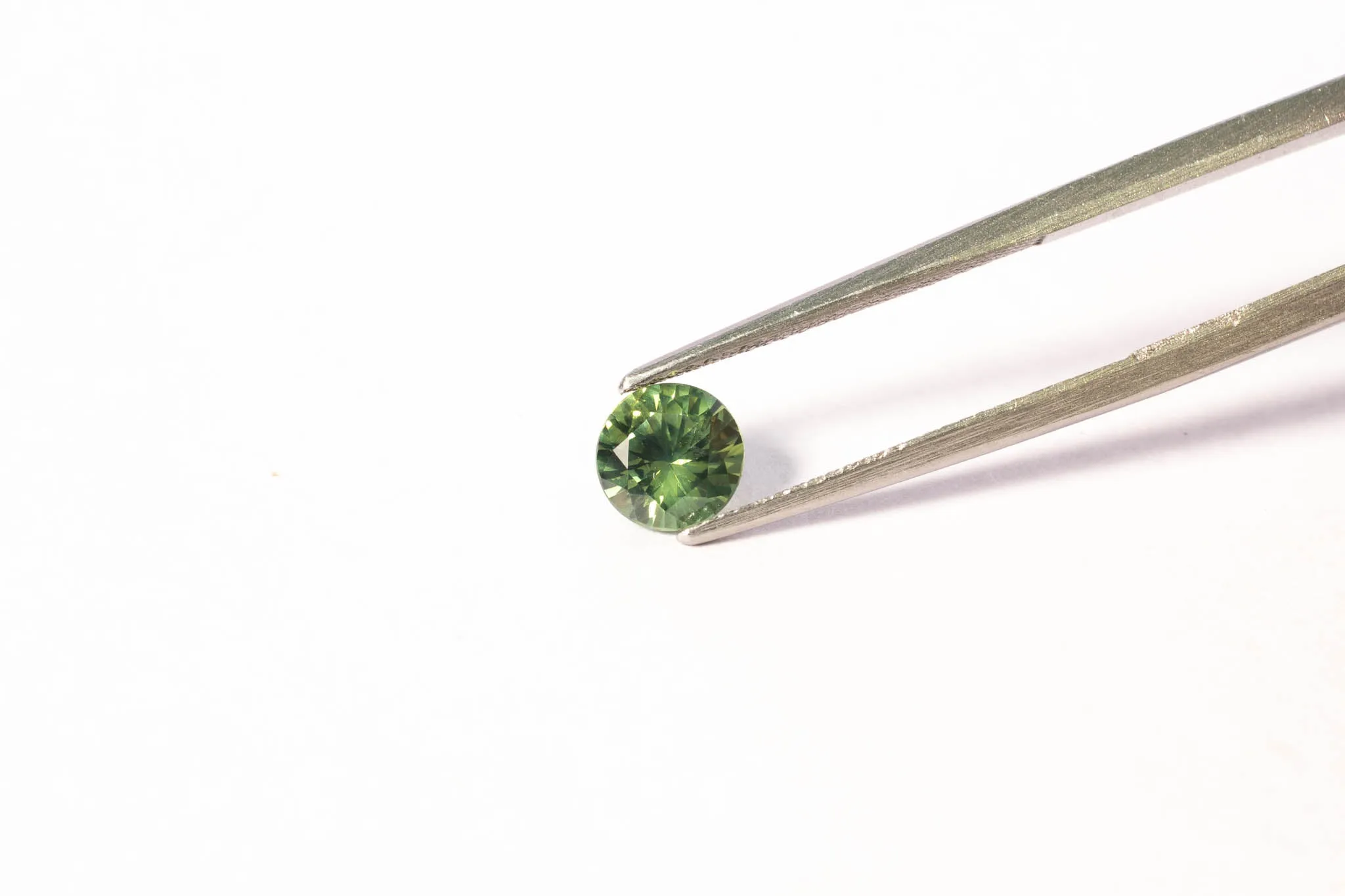 5.6mm Sapphire: 0.85ct Round - Green sold by Sophie Divett Jewelry product image thumbnail 3