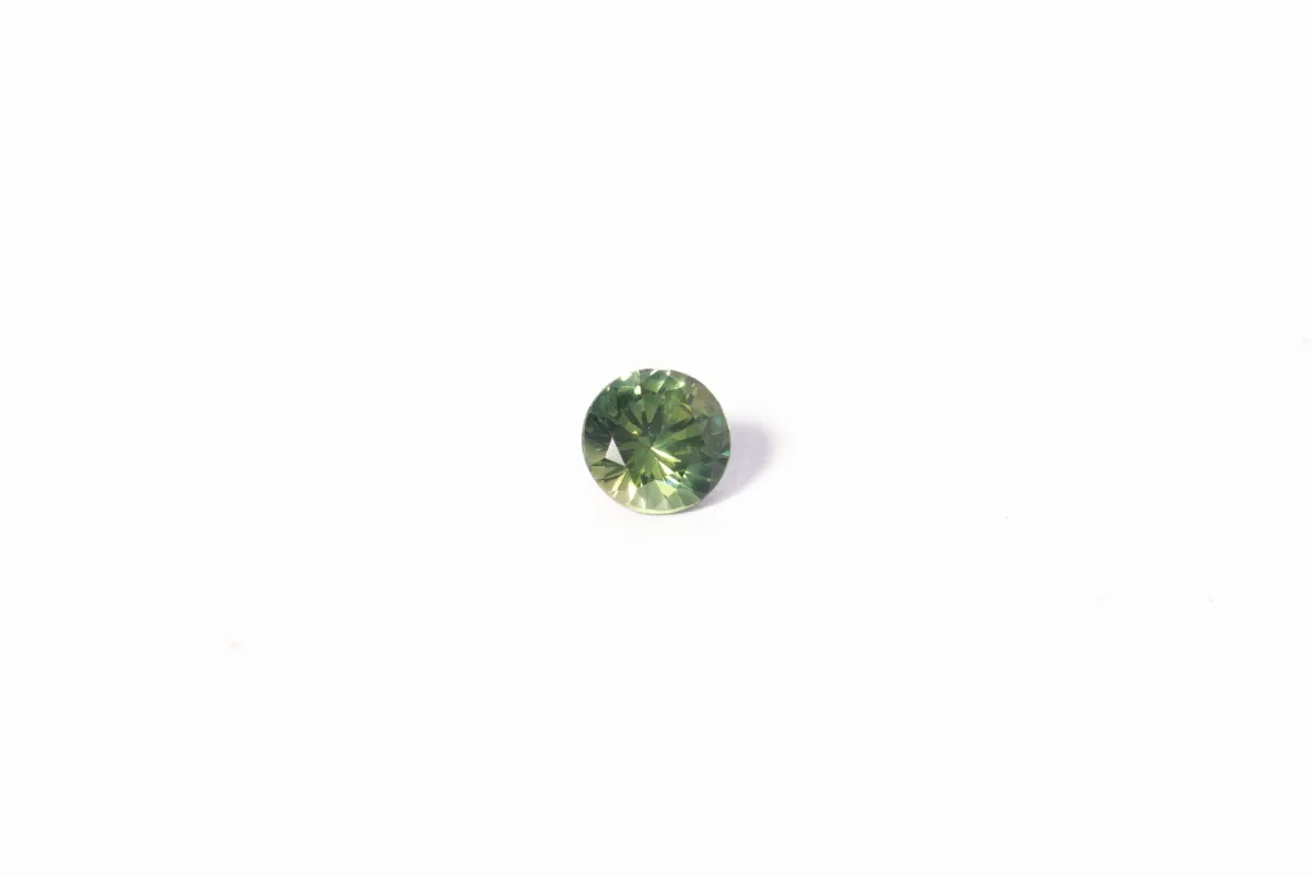5.6mm Sapphire: 0.85ct Round - Green sold by Sophie Divett Jewelry