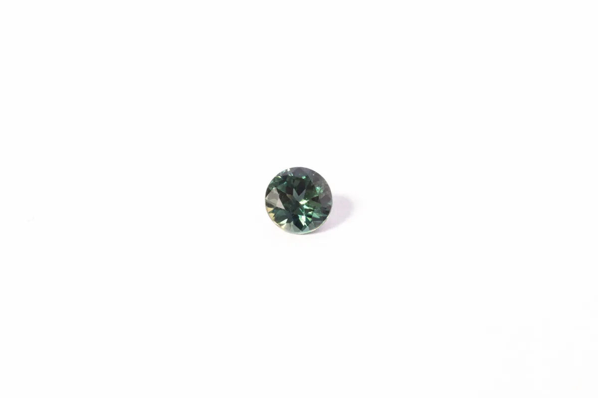 5mm Sapphire: 0.65ct Round - Teal Green sold by Sophie Divett Jewelry