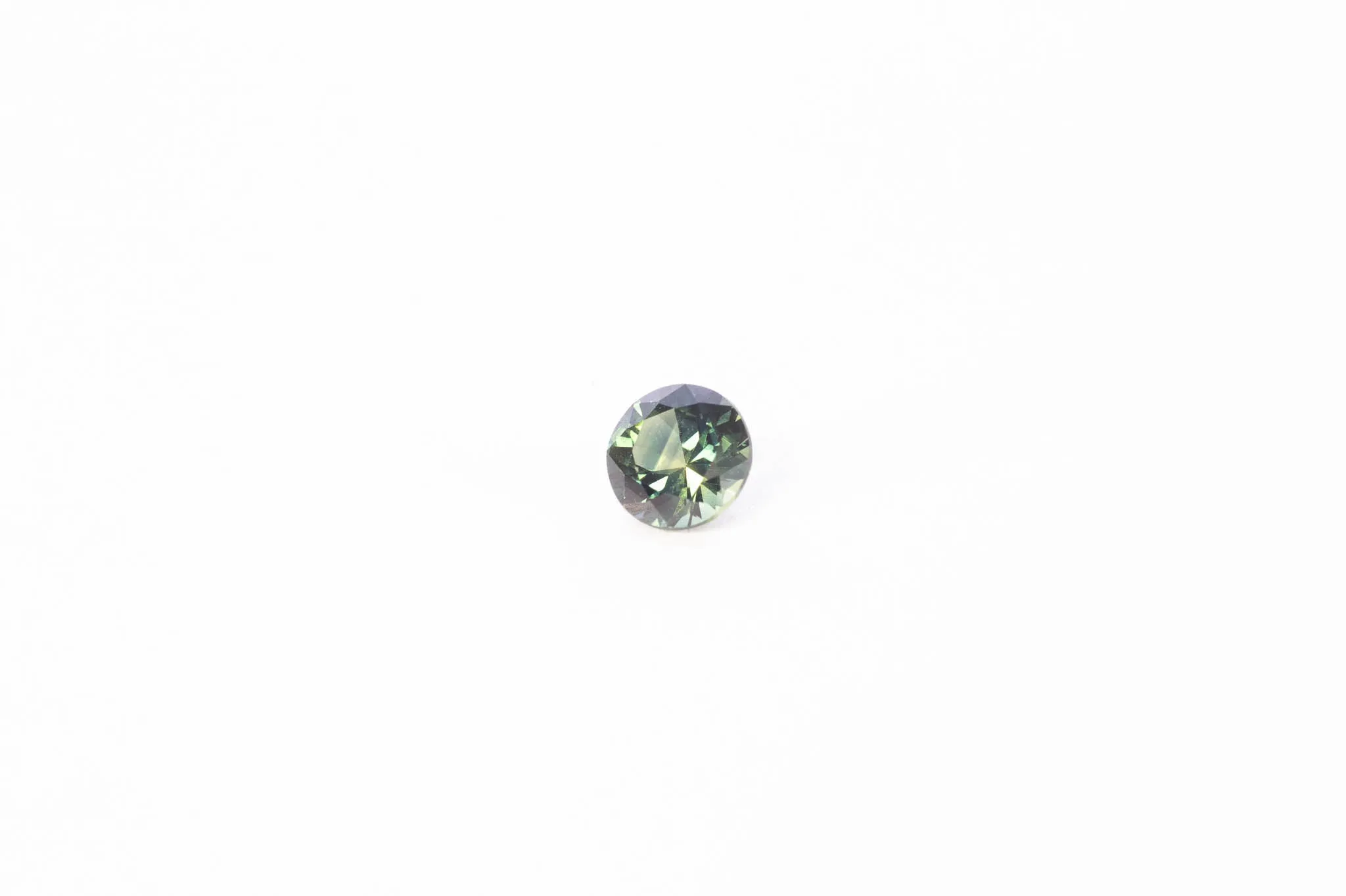 5mm Pharaoh's Eye Sapphire: 0.66ct Round - Green sold by Sophie Divett Jewelry product image thumbnail 4
