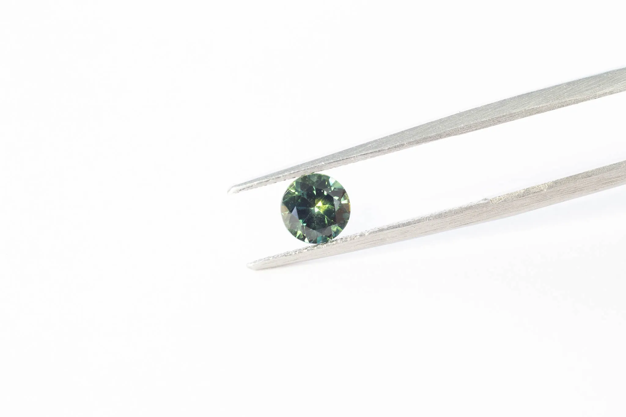 5mm Pharaoh's Eye Sapphire: 0.66ct Round - Green sold by Sophie Divett Jewelry product image thumbnail 3