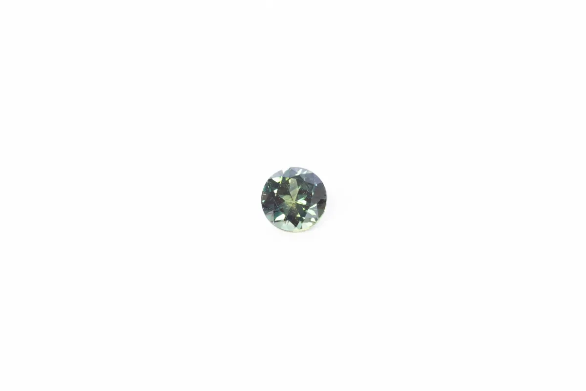 5mm Pharaoh's Eye Sapphire: 0.66ct Round - Green sold by Sophie Divett Jewelry