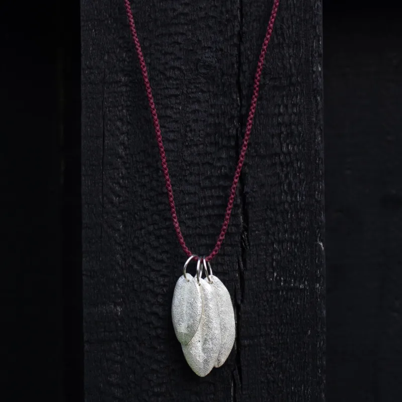 Three Leaf Charm Necklace on  Braided Cord - Sterling Silver sold by Sophie Divett Jewelry