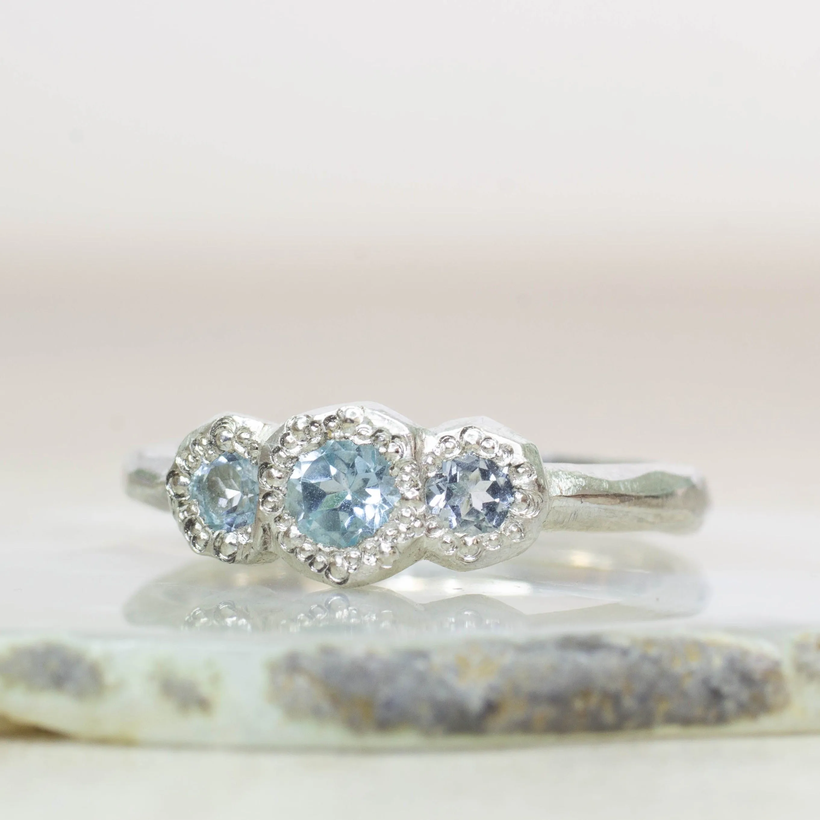 Torci Ring - Sterling Silver with Topaz sold by Sophie Divett Jewelry