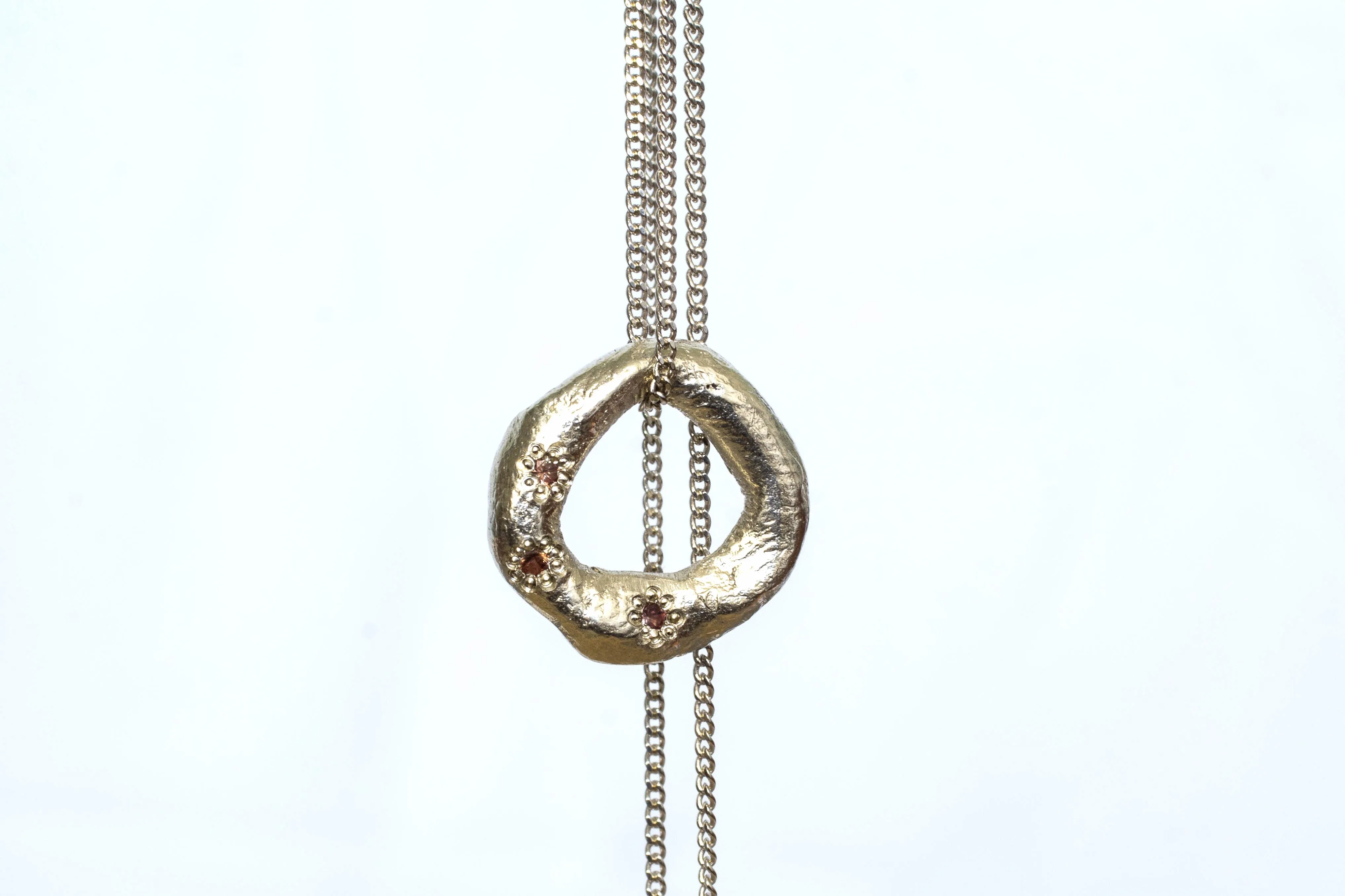 Circle Pendant - White Gold with Padparadscha Sapphires sold by Sophie Divett Jewelry product image thumbnail 4